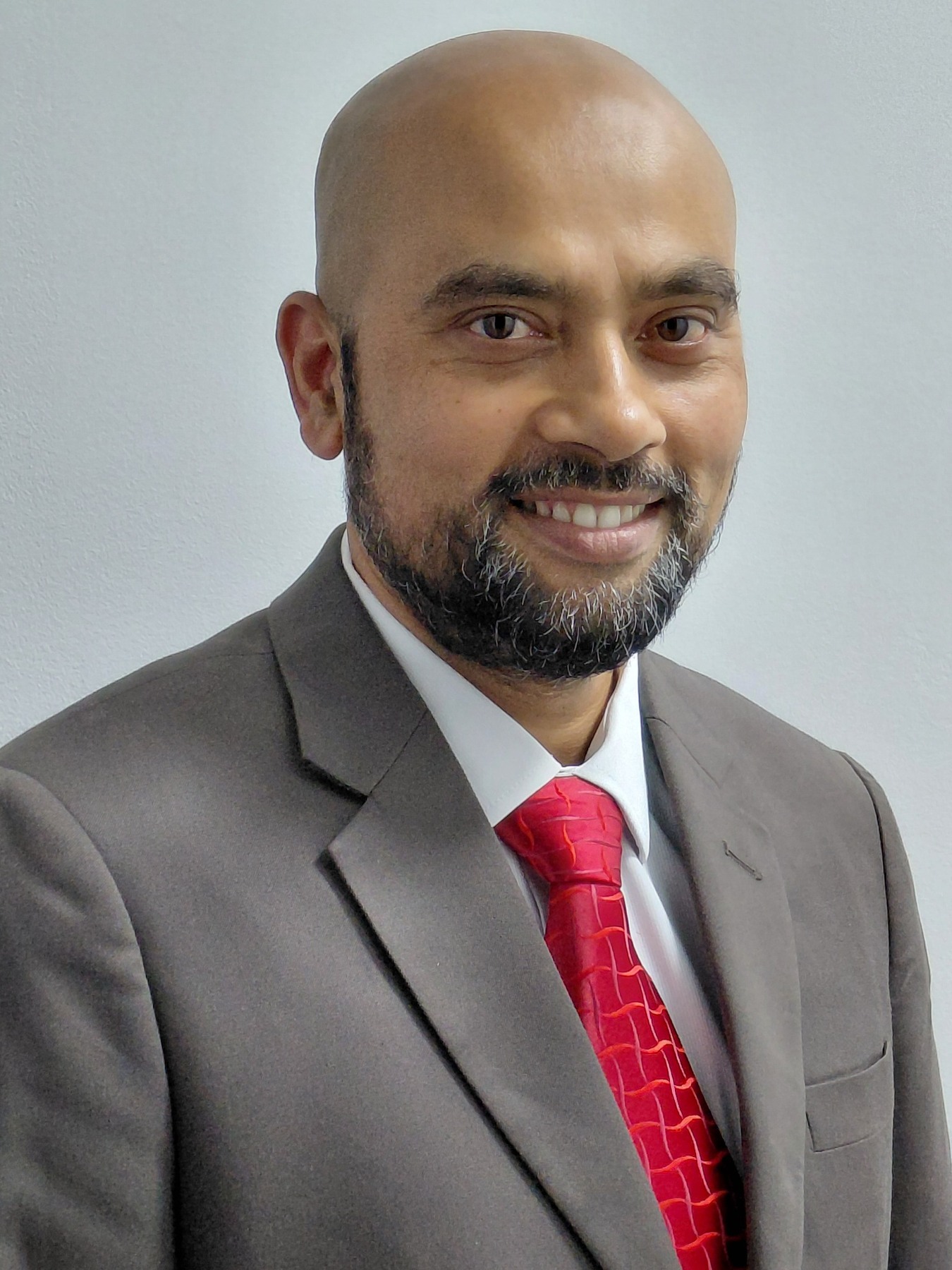 Professional portrait of Moniruzzaman Moni